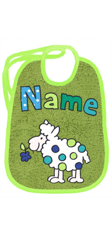 Wolliges Schaf auf moosgrün